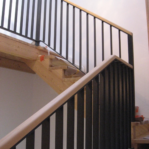 Escalier bois avec rambarde en fer forgé